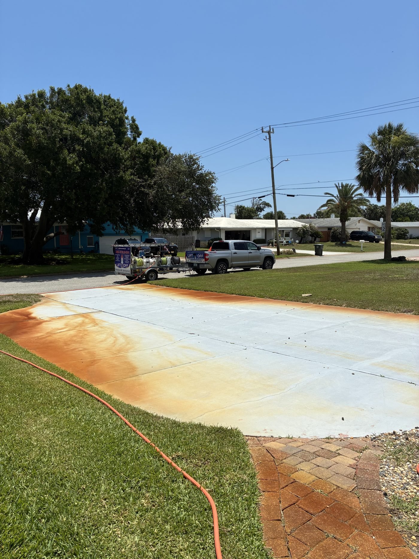 Driveway before, stained with rust